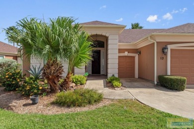 Enjoy lake views and fairway living at 13 Hacienda Dr. This on South Padre Island Golf Club in Texas - for sale on GolfHomes.com, golf home, golf lot