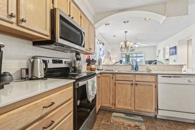 This gorgeous 2-bedroom, 2-bath end unit condo is all about the on The Valley At Eastport in South Carolina - for sale on GolfHomes.com, golf home, golf lot