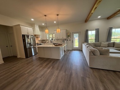 Gorgeous like-new home, built in 2024, offering 4 bedrooms, 3 on Headland Country Club in Alabama - for sale on GolfHomes.com, golf home, golf lot