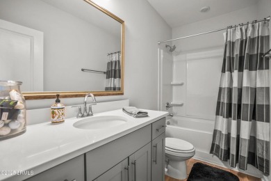 Welcome to this beautifully maintained 1 year old Carson plan- 3 on Ladys Island Country Club in South Carolina - for sale on GolfHomes.com, golf home, golf lot