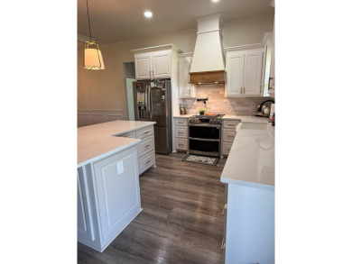 Gorgeous like-new home, built in 2024, offering 4 bedrooms, 3 on Headland Country Club in Alabama - for sale on GolfHomes.com, golf home, golf lot