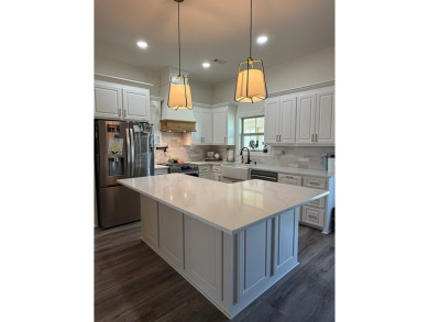 Gorgeous like-new home, built in 2024, offering 4 bedrooms, 3 on Headland Country Club in Alabama - for sale on GolfHomes.com, golf home, golf lot