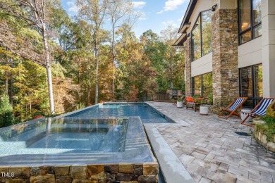 An architectural masterpiece situated perfectly on an extensive on Governors Club in North Carolina - for sale on GolfHomes.com, golf home, golf lot