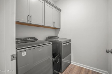 Welcome to this beautifully maintained 1 year old Carson plan- 3 on Ladys Island Country Club in South Carolina - for sale on GolfHomes.com, golf home, golf lot