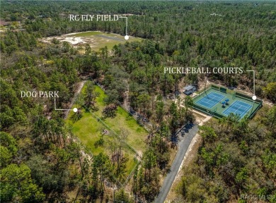 If you're Looking for a beautiful  wonderfully maintained home on Pine Ridge Community Golf and Country Club in Florida - for sale on GolfHomes.com, golf home, golf lot