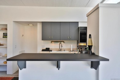 Spectacular Mid-Century Modern home right on the De Anza Golf on Rams Hill Golf Club in California - for sale on GolfHomes.com, golf home, golf lot