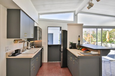 Spectacular Mid-Century Modern home right on the De Anza Golf on Rams Hill Golf Club in California - for sale on GolfHomes.com, golf home, golf lot