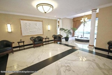 Luxury high-rise, with 24-hour doorman (you will enjoy peace of on Silver Lake Golf Course in New York - for sale on GolfHomes.com, golf home, golf lot