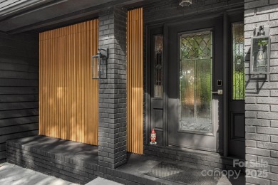 Welcome to this beautifully updated 4-bedroom, 4-bath home on Rumbling Bald Resort on Lake Lure in North Carolina - for sale on GolfHomes.com, golf home, golf lot