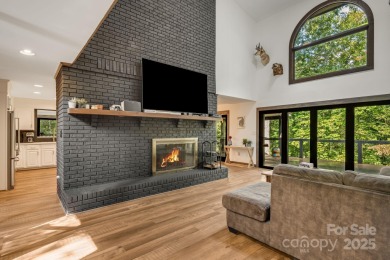 Welcome to this beautifully updated 4-bedroom, 4-bath home on Rumbling Bald Resort on Lake Lure in North Carolina - for sale on GolfHomes.com, golf home, golf lot