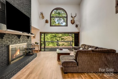 Welcome to this beautifully updated 4-bedroom, 4-bath home on Rumbling Bald Resort on Lake Lure in North Carolina - for sale on GolfHomes.com, golf home, golf lot