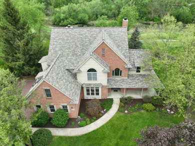 Nestled at the end of a private cul-de-sac, this stunning 4,017 on Stonebridge Golf Club in Michigan - for sale on GolfHomes.com, golf home, golf lot