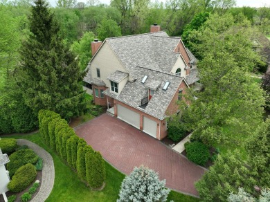 Nestled at the end of a private cul-de-sac, this stunning 4,017 on Stonebridge Golf Club in Michigan - for sale on GolfHomes.com, golf home, golf lot