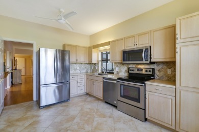 IT'S ALL ABOUT THE WATER VIEW! 2 BR, 2 BA FIRST FLOOR UNIT WITH on Jonathans Landing Golf Club in Florida - for sale on GolfHomes.com, golf home, golf lot