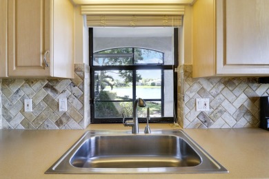 IT'S ALL ABOUT THE WATER VIEW! 2 BR, 2 BA FIRST FLOOR UNIT WITH on Jonathans Landing Golf Club in Florida - for sale on GolfHomes.com, golf home, golf lot