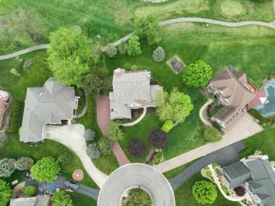 Nestled at the end of a private cul-de-sac, this stunning 4,017 on Stonebridge Golf Club in Michigan - for sale on GolfHomes.com, golf home, golf lot