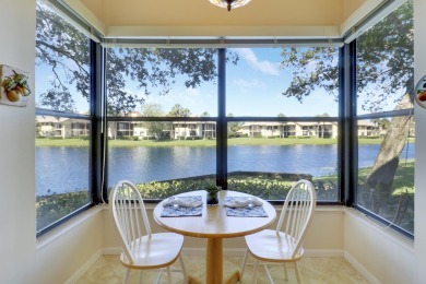 IT'S ALL ABOUT THE WATER VIEW! 2 BR, 2 BA FIRST FLOOR UNIT WITH on Jonathans Landing Golf Club in Florida - for sale on GolfHomes.com, golf home, golf lot