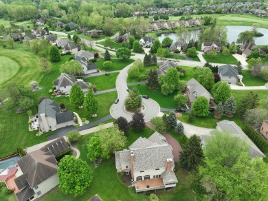 Nestled at the end of a private cul-de-sac, this stunning 4,017 on Stonebridge Golf Club in Michigan - for sale on GolfHomes.com, golf home, golf lot