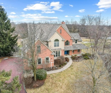 Nestled at the end of a private cul-de-sac, this stunning 4,017 on Stonebridge Golf Club in Michigan - for sale on GolfHomes.com, golf home, golf lot