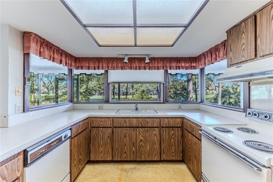 This charming Buttonwood model is a 2-bedroom, 2-bathroom 2-car on Timber Pines Golf Course in Florida - for sale on GolfHomes.com, golf home, golf lot