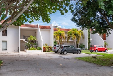 Welcome home to this spacious split bedoom condo with slate on The President Country Club in Florida - for sale on GolfHomes.com, golf home, golf lot