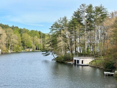 Absolutely magnificent and rare gentle lakefront lot with on Lake Toxaway Country Club in North Carolina - for sale on GolfHomes.com, golf home, golf lot