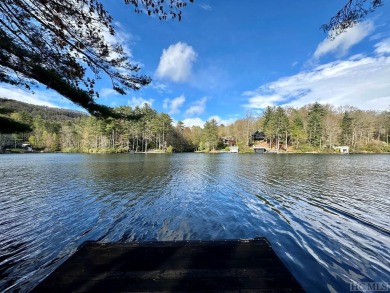 Absolutely magnificent and rare gentle lakefront lot with on Lake Toxaway Country Club in North Carolina - for sale on GolfHomes.com, golf home, golf lot