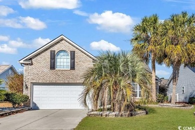 A charming three-bedroom, two-bathroom ranch-style home with a on Heron Point Golf Club in South Carolina - for sale on GolfHomes.com, golf home, golf lot