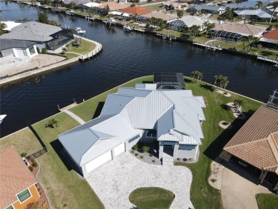 **Exceptional Waterfront Home in PGI with Spectacular Canal on Saint Andrews South Golf Club in Florida - for sale on GolfHomes.com, golf home, golf lot