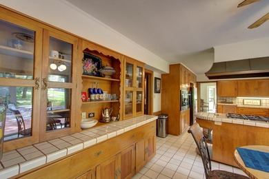 Luxurious brick home on the prestigious Texarkana Country Club on Texarkana Golf and Country Club in Arkansas - for sale on GolfHomes.com, golf home, golf lot