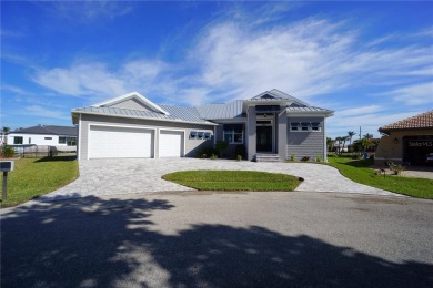 **Exceptional Waterfront Home in PGI with Spectacular Canal on Saint Andrews South Golf Club in Florida - for sale on GolfHomes.com, golf home, golf lot