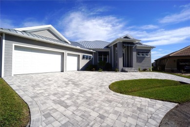 **Exceptional Waterfront Home in PGI with Spectacular Canal on Saint Andrews South Golf Club in Florida - for sale on GolfHomes.com, golf home, golf lot