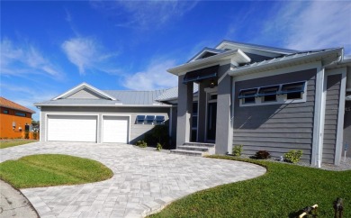 **Exceptional Waterfront Home in PGI with Spectacular Canal on Saint Andrews South Golf Club in Florida - for sale on GolfHomes.com, golf home, golf lot