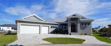 **Exceptional Waterfront Home in PGI with Spectacular Canal on Saint Andrews South Golf Club in Florida - for sale on GolfHomes.com, golf home, golf lot