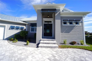 **Exceptional Waterfront Home in PGI with Spectacular Canal on Saint Andrews South Golf Club in Florida - for sale on GolfHomes.com, golf home, golf lot