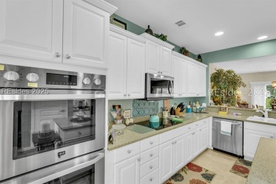Beautifully updated Lilac model on a premium lagoon-view lot in on Hidden Cypress Golf Club in South Carolina - for sale on GolfHomes.com, golf home, golf lot