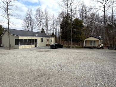 The perfect All-In-One Rough River Lake property on Rough River Dam State Resort Park Golf Course in Kentucky - for sale on GolfHomes.com, golf home, golf lot