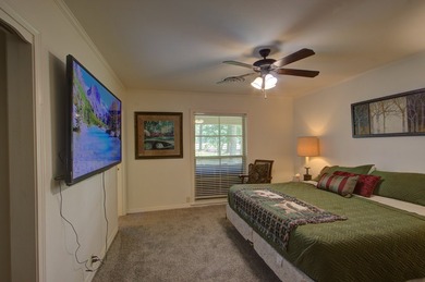 Luxurious brick home on the prestigious Texarkana Country Club on Texarkana Golf and Country Club in Arkansas - for sale on GolfHomes.com, golf home, golf lot