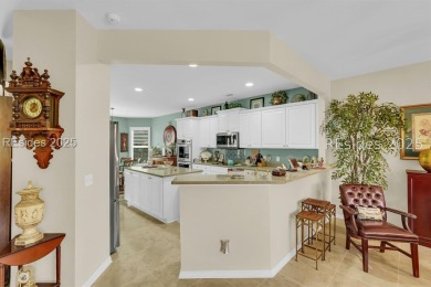 Beautifully updated Lilac model on a premium lagoon-view lot in on Hidden Cypress Golf Club in South Carolina - for sale on GolfHomes.com, golf home, golf lot