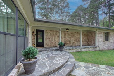 Luxurious brick home on the prestigious Texarkana Country Club on Texarkana Golf and Country Club in Arkansas - for sale on GolfHomes.com, golf home, golf lot
