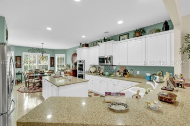 Beautifully updated Lilac model on a premium lagoon-view lot in on Hidden Cypress Golf Club in South Carolina - for sale on GolfHomes.com, golf home, golf lot