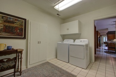 Luxurious brick home on the prestigious Texarkana Country Club on Texarkana Golf and Country Club in Arkansas - for sale on GolfHomes.com, golf home, golf lot