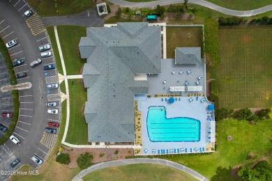 Welcome to this stunning coastal retreat in the prestigious on Brunswick Plantation and Golf Resorts in North Carolina - for sale on GolfHomes.com, golf home, golf lot