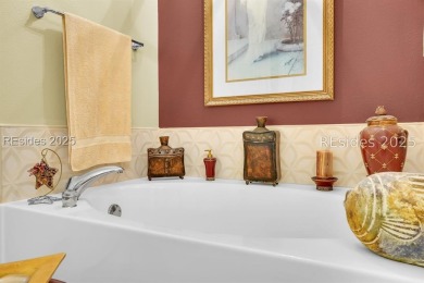 Beautifully updated Lilac model on a premium lagoon-view lot in on Hidden Cypress Golf Club in South Carolina - for sale on GolfHomes.com, golf home, golf lot
