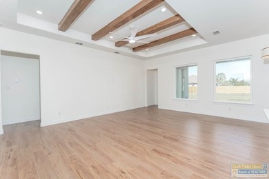 Discover luxury living with this stunning 3 bedroom, 2.5 bath, 1 on South Padre Island Golf Club in Texas - for sale on GolfHomes.com, golf home, golf lot