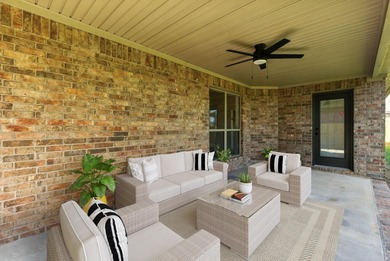 This traditional home located on a quiet street in the Country on The Country Club of Arkansas in Arkansas - for sale on GolfHomes.com, golf home, golf lot