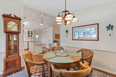 2/2 Manufactured Home with Dual Screened Lanais, Carport and on El Diablo Executive Golf Course in Florida - for sale on GolfHomes.com, golf home, golf lot