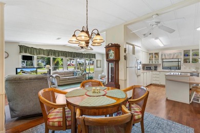 2/2 Manufactured Home with Dual Screened Lanais, Carport and on El Diablo Executive Golf Course in Florida - for sale on GolfHomes.com, golf home, golf lot