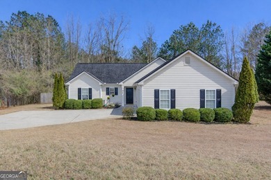 Fresh updates, 1.47 acres, and NO HOA make this Monroe property on Monroe Golf and Country Club in Georgia - for sale on GolfHomes.com, golf home, golf lot
