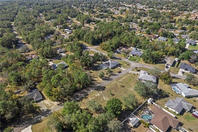 Cleared, flat, and elevated above the road, this ready-to-build on Citrus Springs Country Club in Florida - for sale on GolfHomes.com, golf home, golf lot